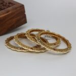 Elegant Gold Plated Pearl Bangle Set (Set Of 4)