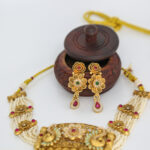 Gold Peacock Pendant Necklace Set with Pearls & Floral Motifs - Image 2
