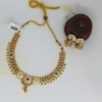 Temple-Inspired Gold Necklace Set with Enamel Detailing