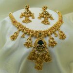 Antique Gold-Plated Temple Necklace Set with Green Stone Pendant & Designer Jhumka Earrings